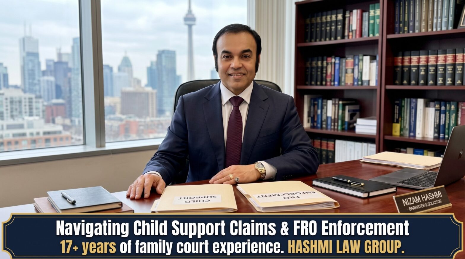 Nizam Hashmi seated in a Toronto law office with child support documents.